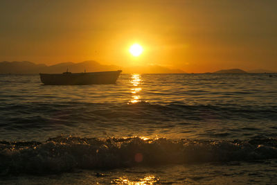 Scenic view of sea during sunset