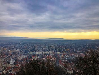High angle view of buildings against sky during sunset
