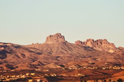 Scenic view of rocky mountains against clear sky