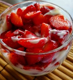 High angle view of strawberries in glass on table