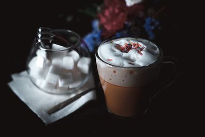 Close-up of coffee served on table