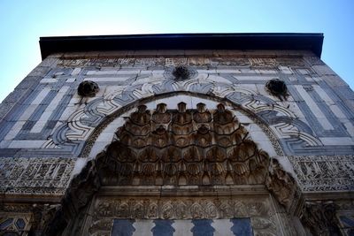 Low angle view of sculpture against clear sky