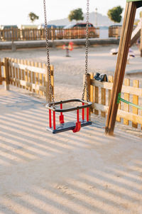 Empty swing at playground