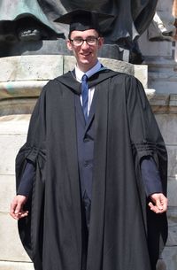 Portrait of smiling man standing outdoors