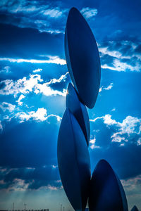 Low angle view of balloons against sky