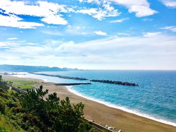 Scenic view of beach against sky