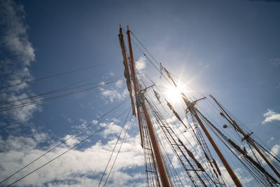 Low angle view of sailboat against sky on sunny day