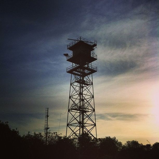 low angle view, silhouette, sky, electricity pylon, fuel and power generation, electricity, technology, cloud - sky, sunset, power supply, connection, tree, power line, dusk, cloudy, cloud, tall - high, tower, nature, outdoors