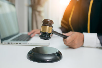 Close-up of man using mobile phone