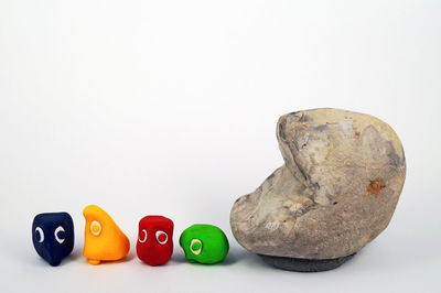 Close-up of multi colored pencils on white background