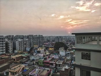 High angle view of townscape against sky during sunset