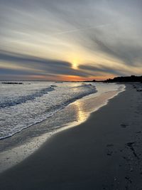 Scenic view of sea against sky during sunset