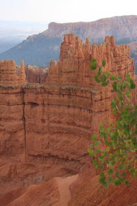 Scenic view of cliff against sky