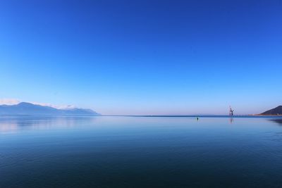 View of sea against blue sky