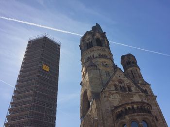 Low angle view of kaiser wilhelm memorial church against sky