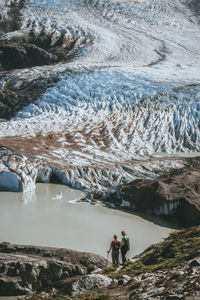 High angle view of hikers on mountain