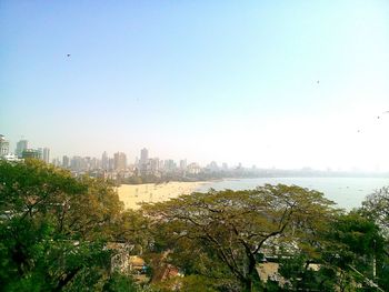 View of cityscape against clear sky