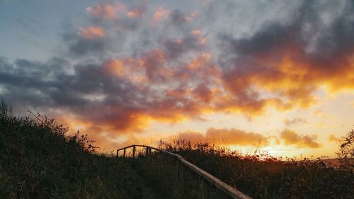 Scenic view of dramatic sky during sunset