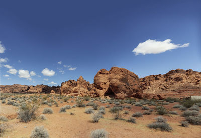 Rock formations in desert against sky