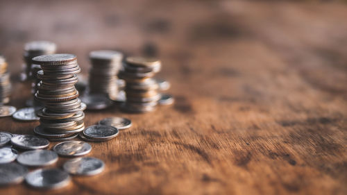 Close-up of coins on table