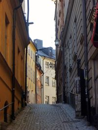 Narrow alley along buildings