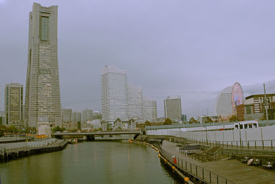 Buildings in city against sky