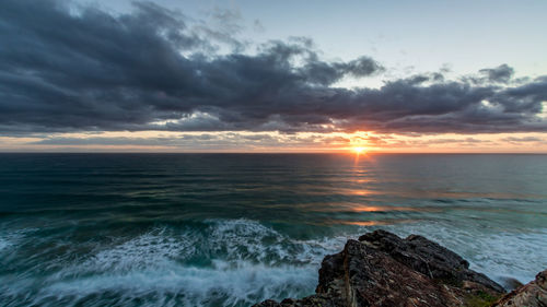 Scenic view of sea against sky during sunset