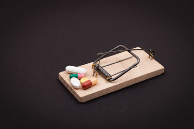 High angle view of pencil on table against black background