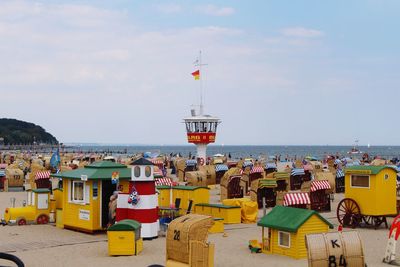 Panoramic view of beach and buildings against sky