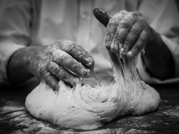 Close-up of person preparing food