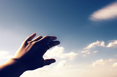 Low angle view of person against sky