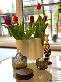 Close-up of flower vase on table