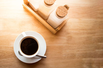 High angle view of coffee cup on table