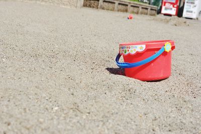 Toy on sand at beach