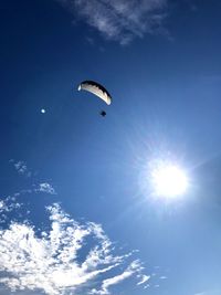 Low angle view of kite flying in sky
