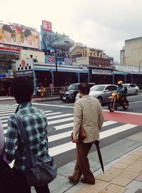 Woman walking on street