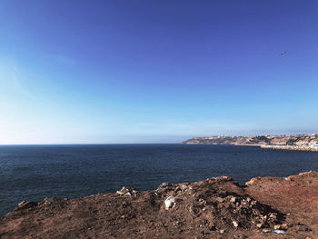 Scenic view of sea against clear sky