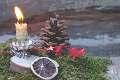 Close-up of burning candles as a christmas decoration. 