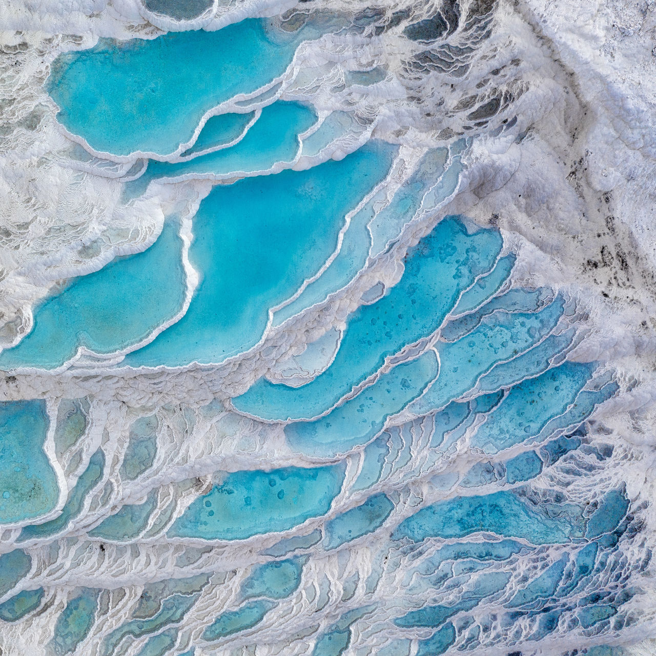 FULL FRAME SHOT OF BLUE WATER ON LAND