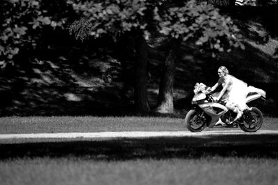 View of man riding motorcycle
