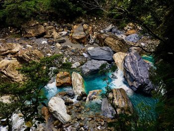 High angle view of rocks in river