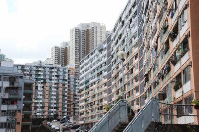 Low angle view of modern buildings against sky