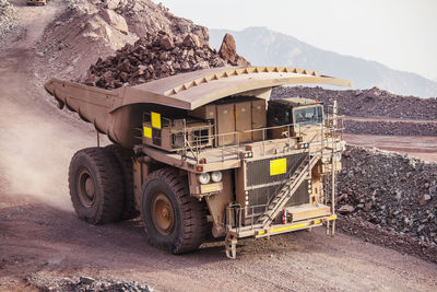 Mining activity, mining dump truck, high angle view of truck working on field