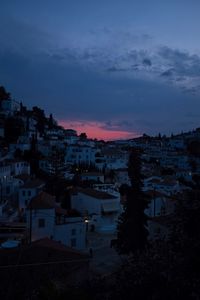 High angle shot of townscape against sky at sunset