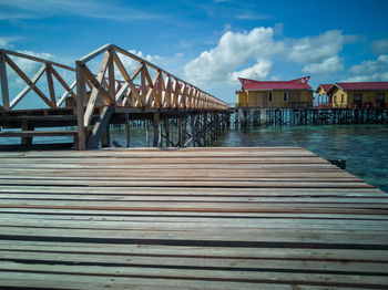 Water chalet view from the pier in a sunny day.