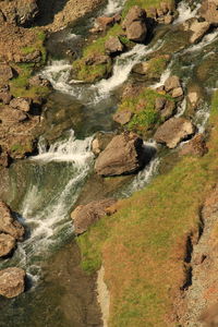 Stream flowing through rocks