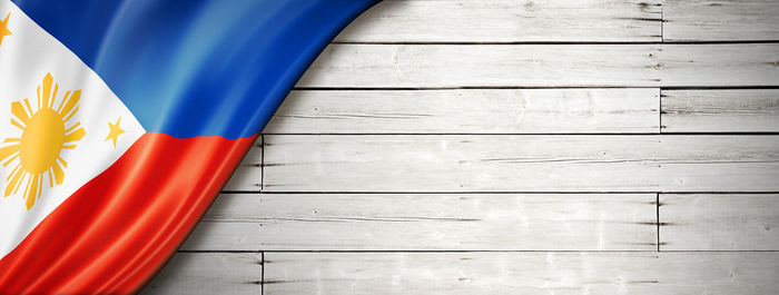 High angle view of flag on wooden table