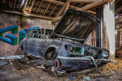 Close-up of abandoned car