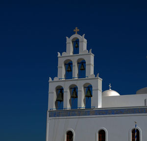 Low angle view of building against blue sky