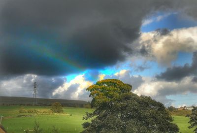 Low angle view of rainbow against sky